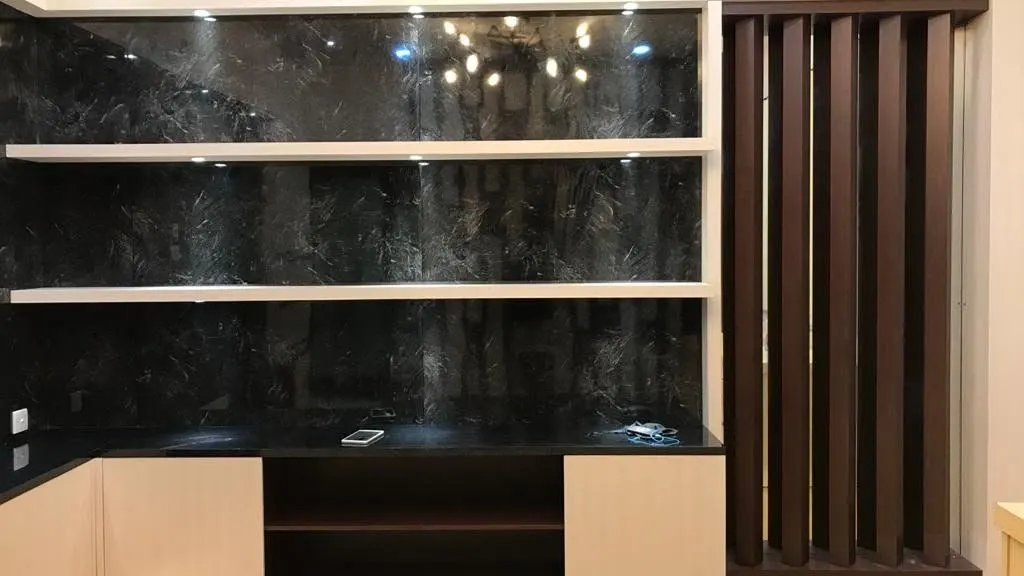 Custom display wall with lit shelves