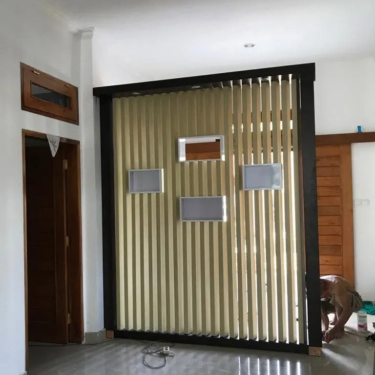 Slatted timber partition beside a doorway